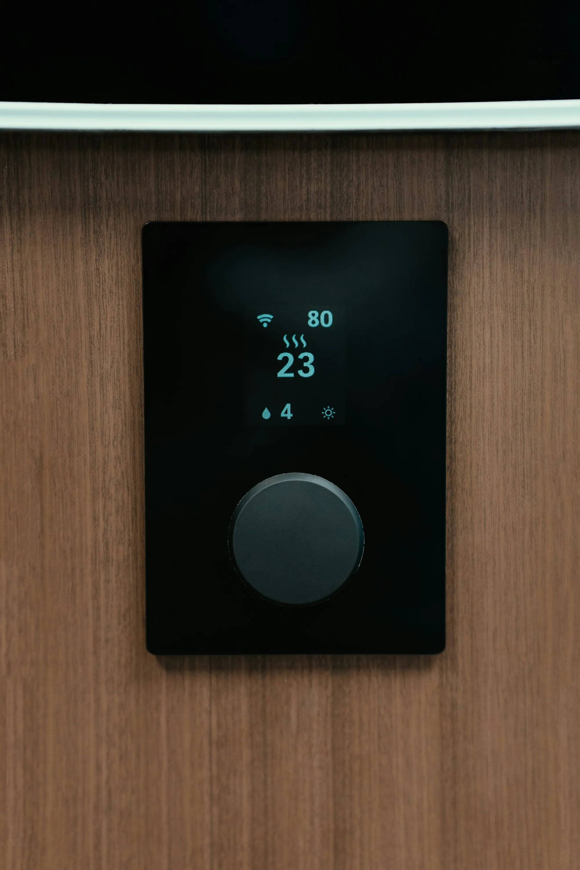 Smart thermostat display showing room temperature